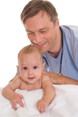 doctor examining newborn on a whiteの写真素材