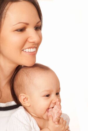 nice happy mom holds the babyの写真素材