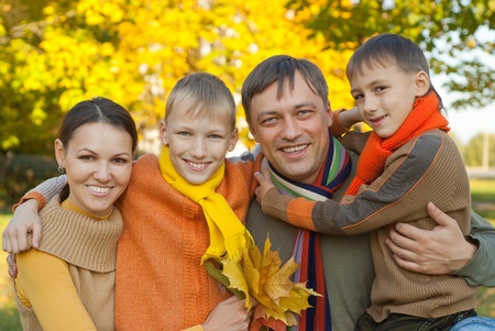 happy family of four on the natureの写真素材
