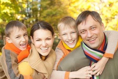 happy family of four on the natureの写真素材