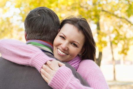 happy nice couple in a autumn parkの写真素材