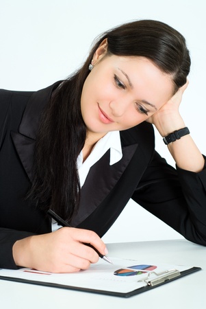 nice girl in a business suit working in the officeの写真素材