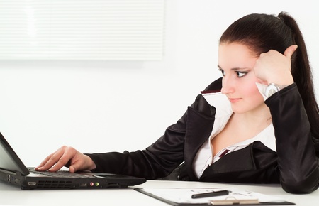 woman in a business suit working in the officeの写真素材