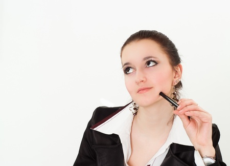 beautiful woman in a black business suit with a whiteの写真素材