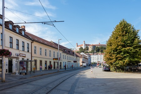 The image of a street with the railway on the hill is Bratislava castle, Slovakiaのeditorial素材