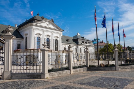 The Grassalkovich Palace with National flags of the Slovak Republic and European Union, Bratislava, Slovakiaのeditorial素材