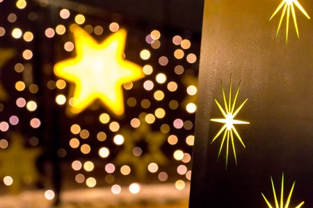 A star in focus and bokeh effect blurry lighting abstract backgroundの写真素材