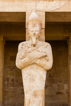 A sculpture of Pharaoh at the Mortuary temple of Hatshepsut near the Egyptian city of Luxor, Egyptの写真素材