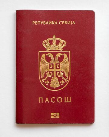 Serbian passport isolated on white paper backgroundの写真素材