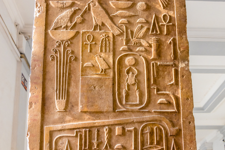 Cairo, Egypt - April 19, 2019: View of the column with ancient hieroglyphics at the Egyptian Museum...