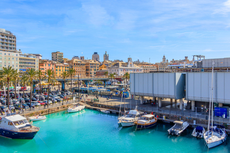GENOA, ITALY - MARCH 9, 2019: The Aquarium of Genoa and the historic medieval center of the cityのeditorial素材