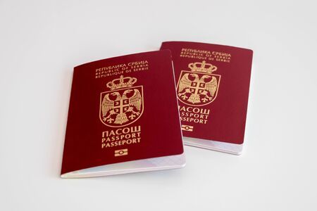 Two Serbian passports on white background, selective focus, conceptの写真素材