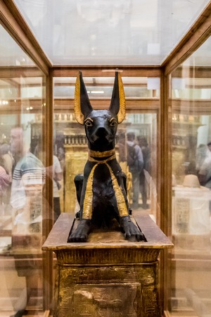 Cairo, Egypt - April 19, 2019: Anubis of Ancient Egypt God of Death. The Egyptian statue of God Anubis from Tutankhamun tomb in the Egyptian Museum, Cairoのeditorial素材