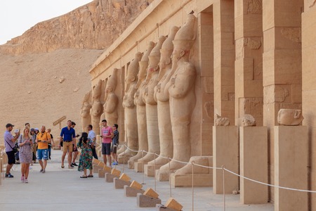 Luxor, Egypt - April 16, 2019: Tourists visit the mortuary temple of Hatshepsut, 18th dynasty...