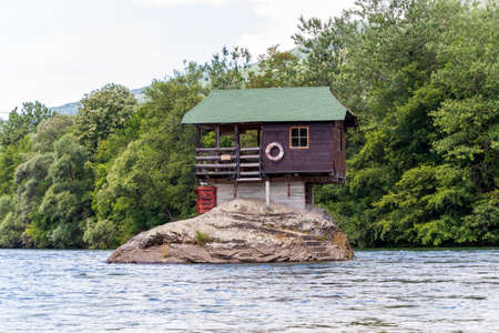 Bajina Basta, Serbia - July 14, 2020: Drina river house is a wooden, cabin-like house on the rock in the middle of the Drina river, near the town of Bajina Basta in western Serbiaのeditorial素材