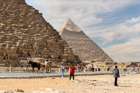 Giza, Egypt - August 15, 2021: The Pyramid of Khufu and the Pyramid of Khafre with dramatic sky in Egyptのeditorial素材