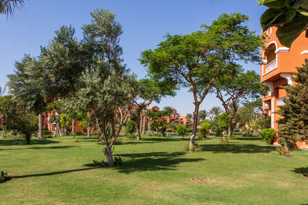 Hurghada, Egypt - September 25 2021: Egyptian garden with palm trees in hotel Caribbean World Resort Soma Bayのeditorial素材