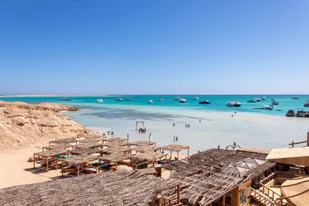 Hurghada, Egypt - September 23 2021: Orange Bay Beach with crystal clear azure water and boat ships with touristsのeditorial素材