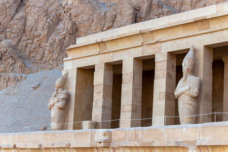 The Hatshepsut statues by the columns on the highest terrace of the Mortuary Temple of Hatshepsut, Luxor, Egyptのeditorial素材