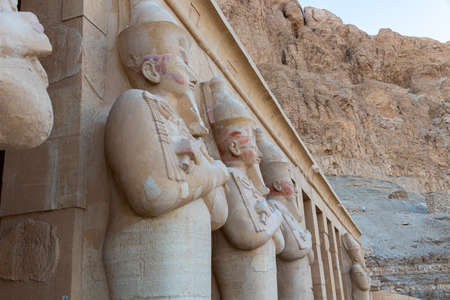 The Hatshepsut statues by the columns on the highest terrace of the Mortuary Temple of Hatshepsut, Luxor, Egyptのeditorial素材