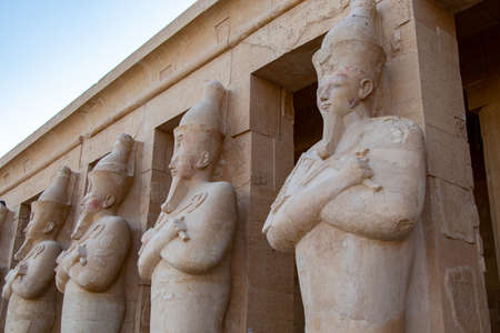 Hatshepsut statues by the columns on the highest terrace of the Mortuary Temple of Hatshepsut, Luxor, Egyptのeditorial素材