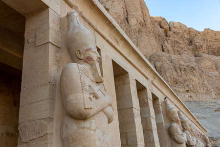 Hatshepsut statues by the columns on the highest terrace of the Mortuary Temple of Hatshepsut, Luxor, Egyptのeditorial素材