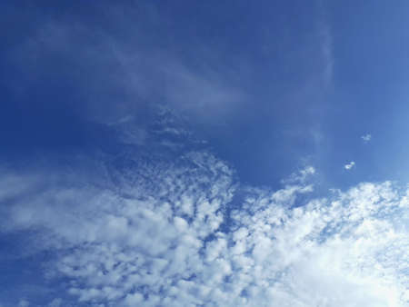 Beautiful white clouds, blue sky, the azure stratosphere, and spindrift, with texture background in...