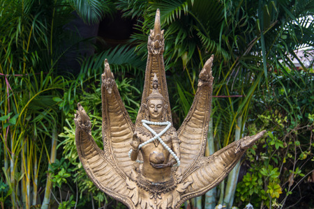 Deva in a Naga at Samarn temple, Thailandの写真素材