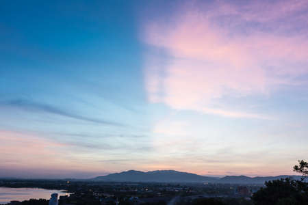 Sunrise behine a mountainの写真素材