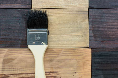 Brush and wood to decor a houseの写真素材
