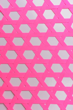 Pink paper was weave with horizontal patternの写真素材