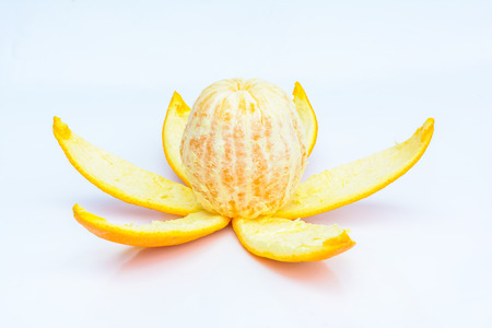 Peeled orange on white backgroundの写真素材