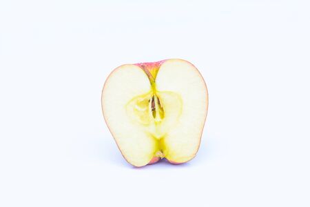 Apple was cut on white backgroundの写真素材