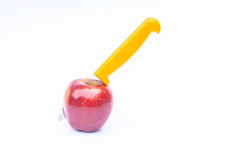 Apple and knife on white backgroundの写真素材
