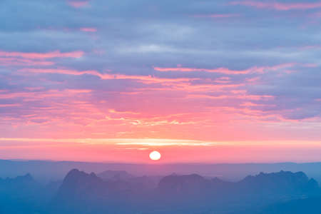 Sunrise with cloudy and blue sky background. Nature and outdoor background in national park at Thailandの写真素材