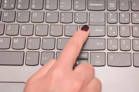 Business concept: computer keyboard with Business Meeting, selected focus on enter button backgroundの写真素材
