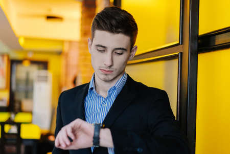 Creative young businessman in the cafe. portraitの写真素材