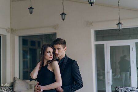 Young beautiful hipster couple vintage style posing outdoor on the street fashion style having fun...