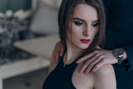 Elegant couple passing in classic clothes. Close up, cut shootの写真素材