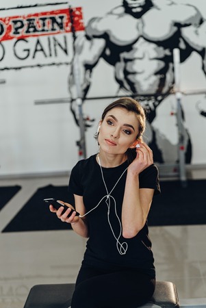 strong woman is going to listen music
