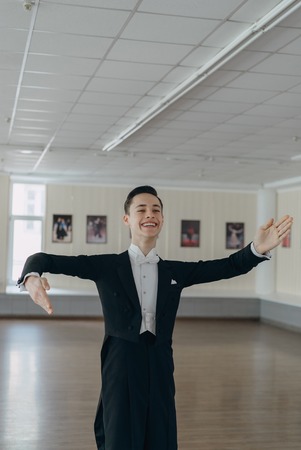 Professional dancer trained at the mirror. The young boyの写真素材