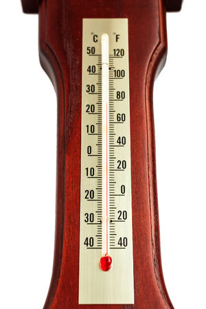 Thermometer Isolated on White Background. At thermometer wooden baseの写真素材