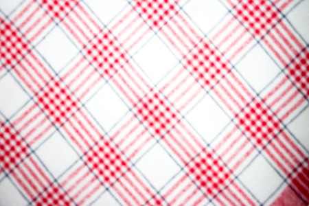 Blurred red checkered fabricの写真素材