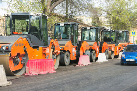 SAMARA, RUSSIA - MAY 14, 2017: A group asphalt compactors is located on Vilonovskaya Street in...