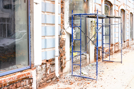 Reconstruction of the building. Scaffolding stand near the buildingの写真素材