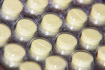 Photo of Yellow pills in a blister pack