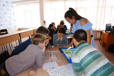 CHAPAEVSK, SAMARA REGION, RUSSIA - DECEMBER 07, 2017: School kids of elementary school in class during the lesson with teacher womanのeditorial素材