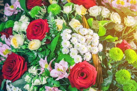 A beautiful bouquet of roses, lilies, chrysanthemums in the sunshine