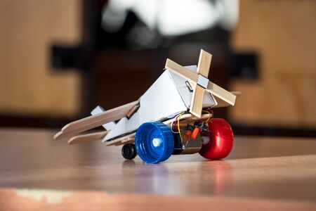Small Airplane toy handmade on the tableの写真素材