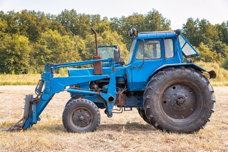 Tractor for working in the field and mowing grass. Agricultural machinery